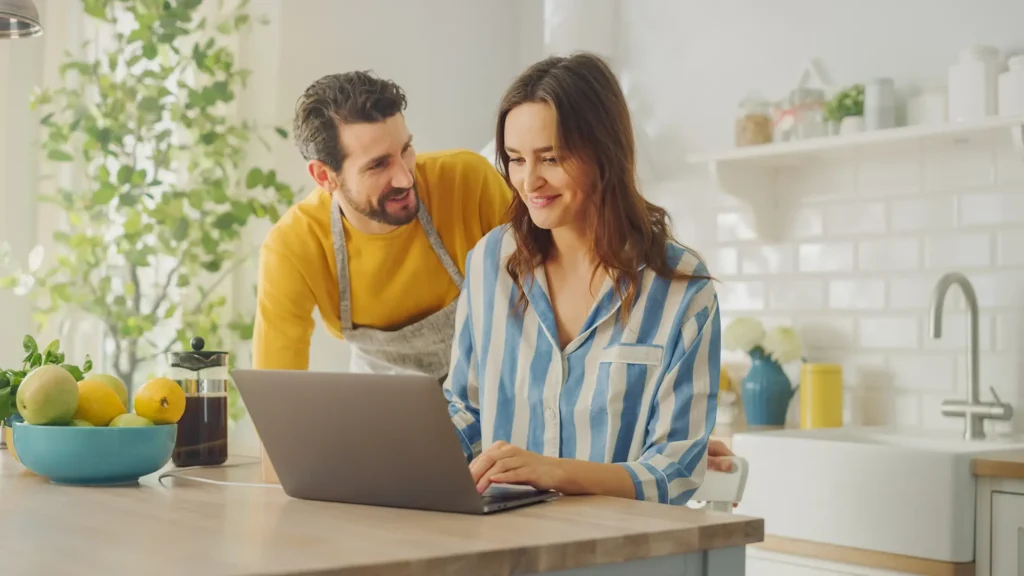 couple with a laptop